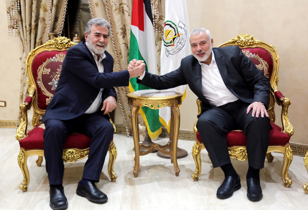 Former Prime Minister of Palestine in Gaza, Ismail Haniyeh and Palestinian politician Ziyed al-Nakhalah